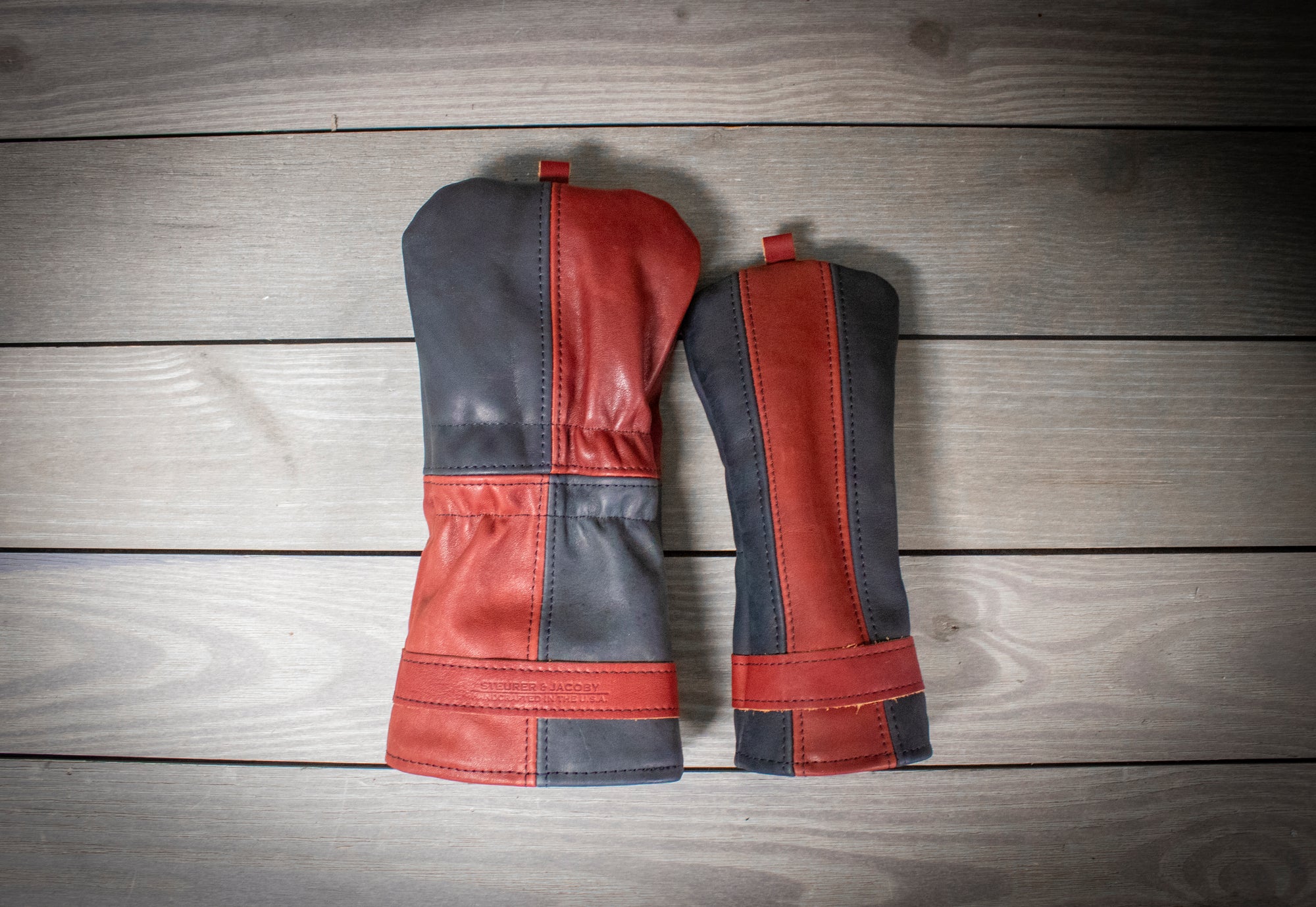 Black and Burgundy Leather Wood Covers- Steurer & Jacoby