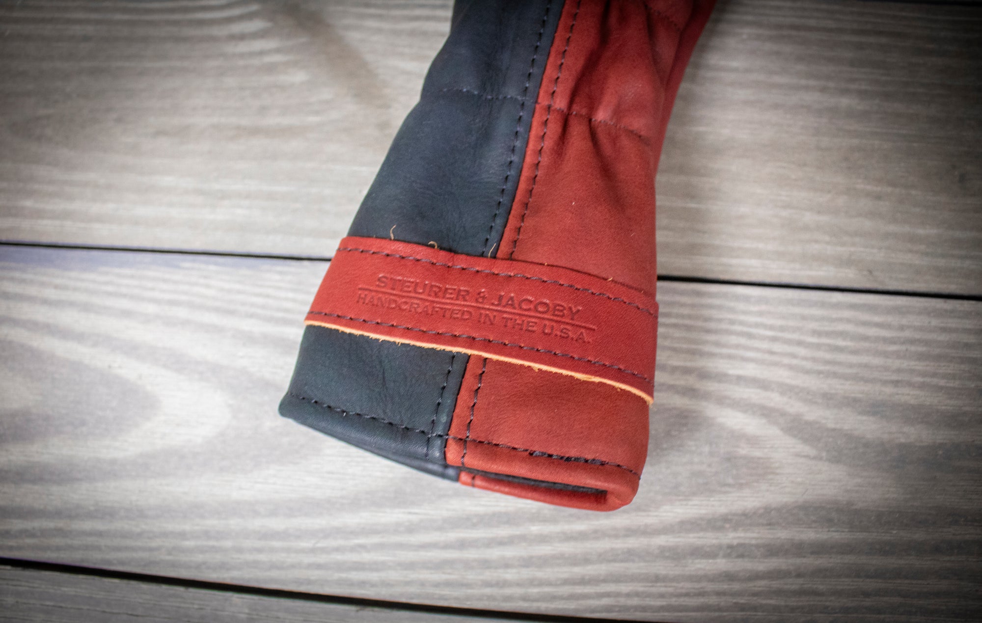 Black and Burgundy Leather Wood Covers- Steurer & Jacoby
